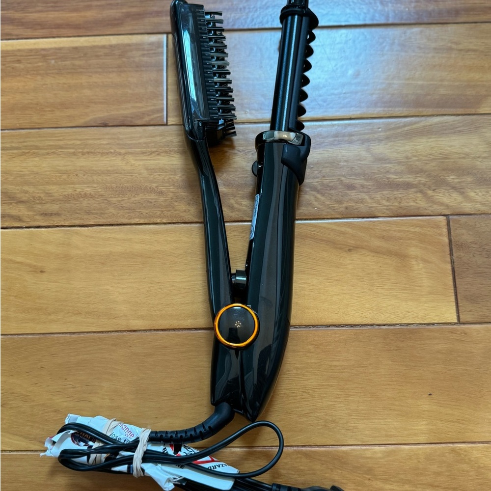 Black Hair Styling Tool with Orange Accent
